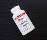 VitaminMed Stress and Adrenal Support chewable tablets in a hand