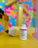 VitaminMed Stress and Adrenal Support chewable tablets with a measuring spoon
