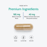 Vitanica Black Cohosh capsules displayed with herbs