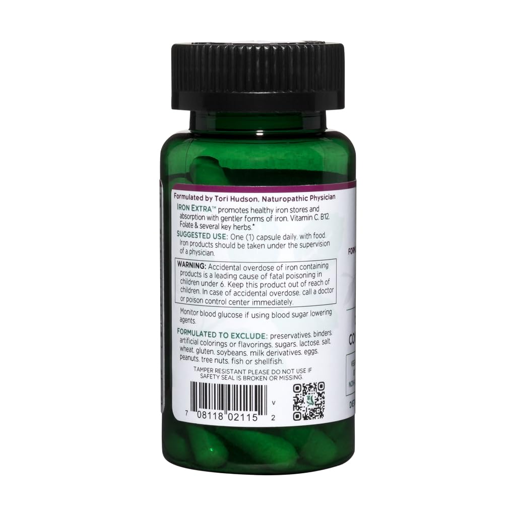 Vitanica Iron Extra 100g supplement capsules on a wooden surface