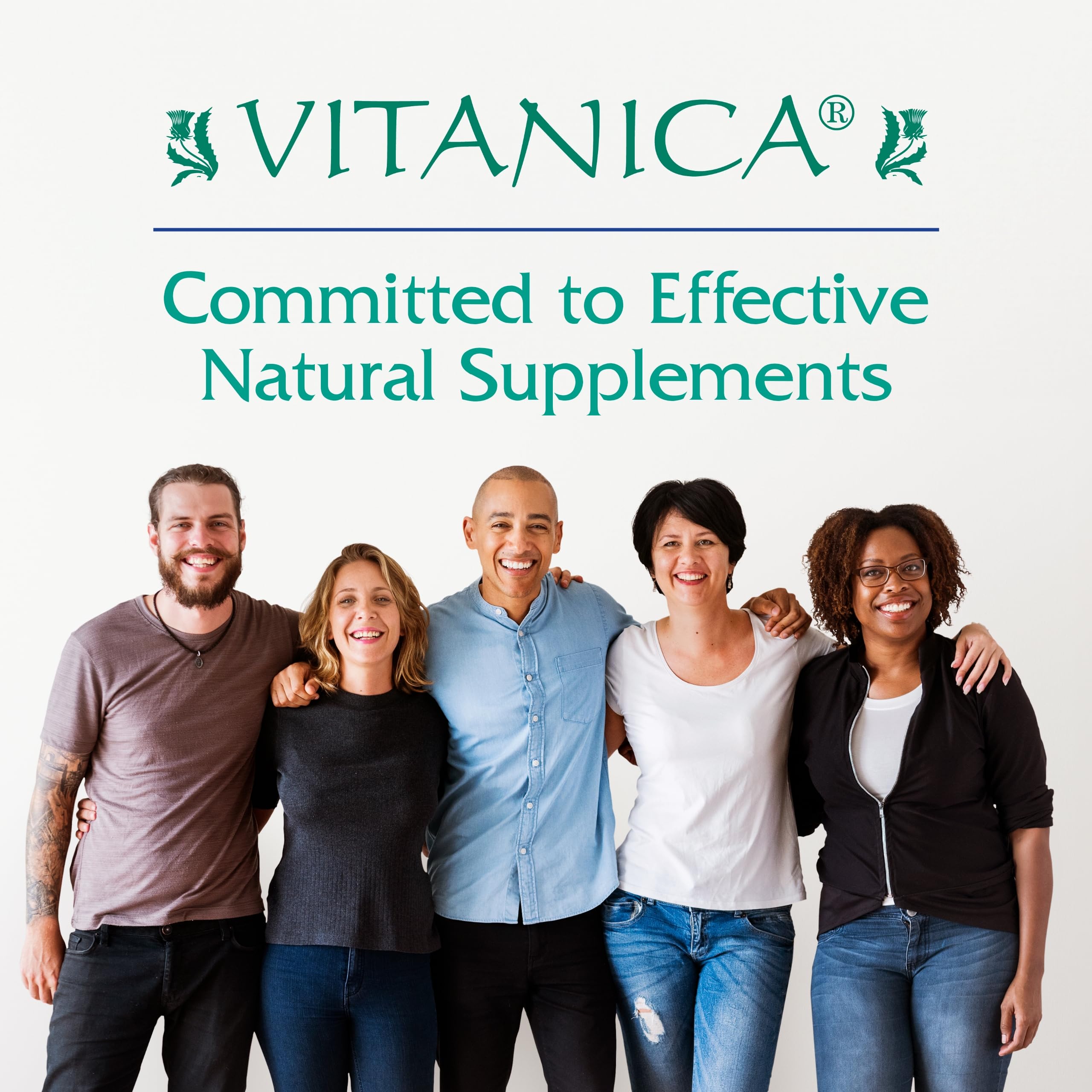 Vitanica Iron Extra capsules next to fresh herbs