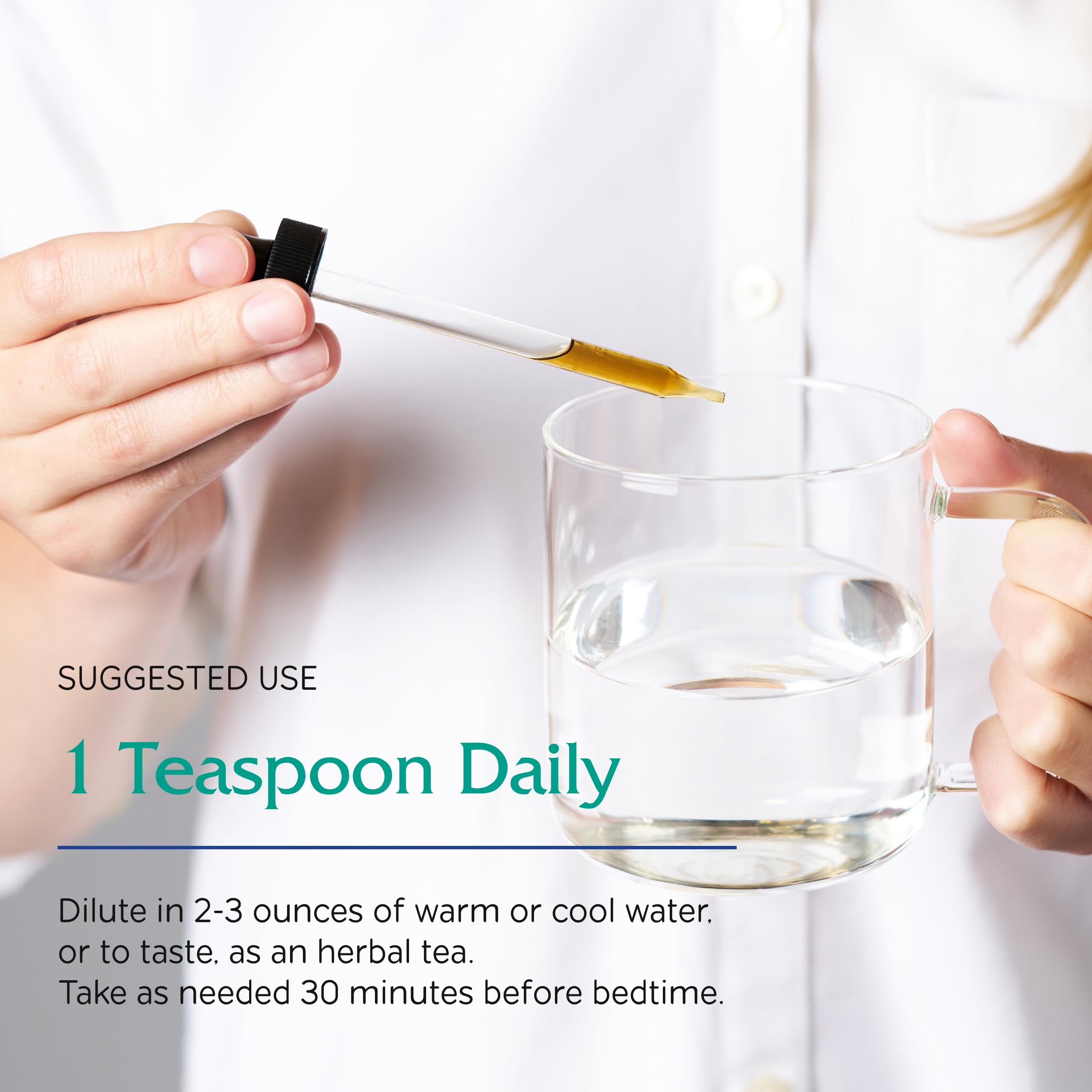 Vitanica Sleep Tonic bottle with a teaspoon for dosage