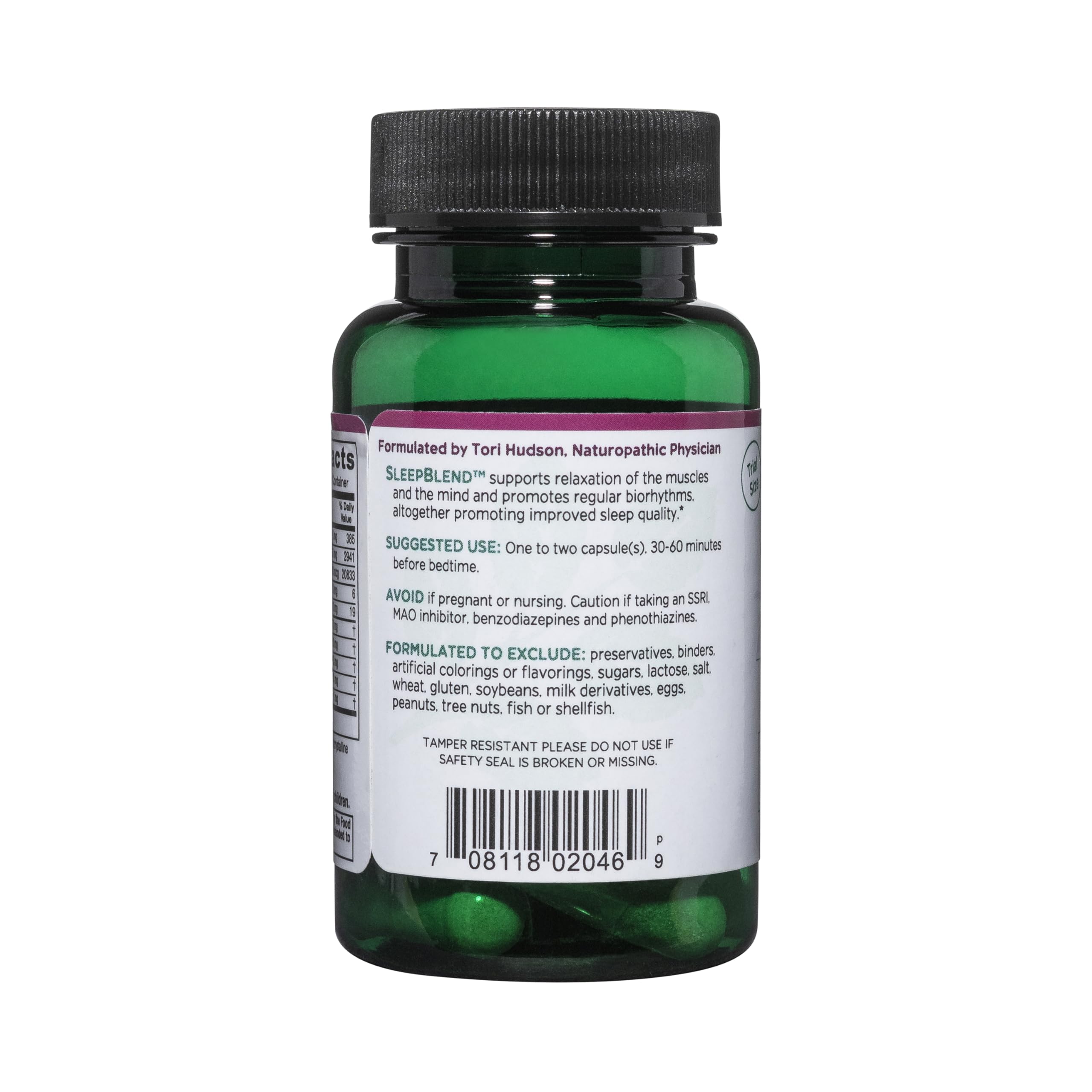 Vitanica SleepBlend capsules on a wooden surface