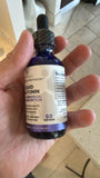 VITASEI Liquid Melatonin bottle with dropper in lifestyle setting