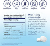 Vitassium FastChews chewable electrolyte tablets on a wooden table