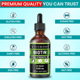 VITBOOST Biotin Liquid Drops 10,000mcg liquid drops in a spoon