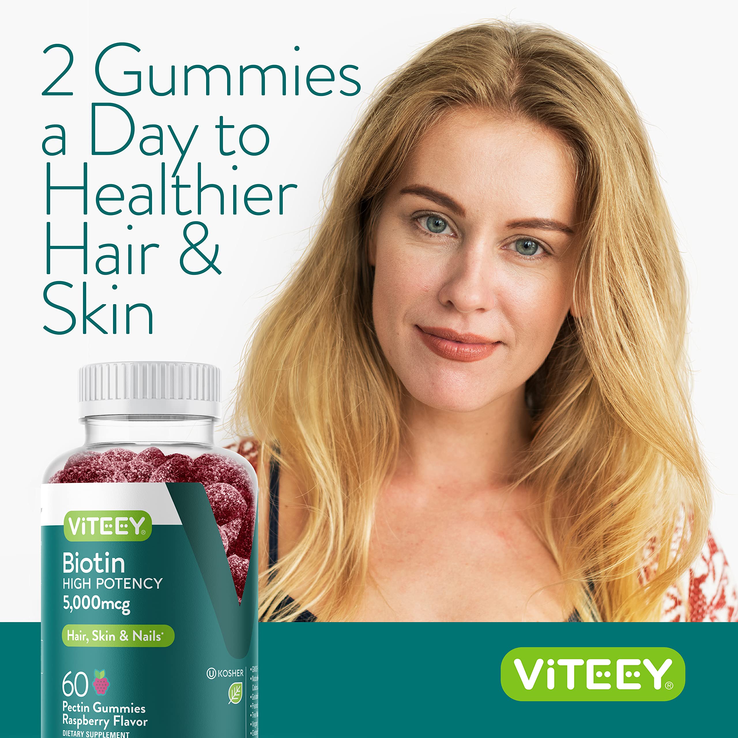 Viteey Biotin Gummies bottle with fresh raspberries