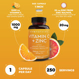 Viva Naturals Vitamin C + Zinc Sulfate capsules on a wooden table