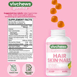 vivchews Biotin Gummies on a wooden table lifestyle shot