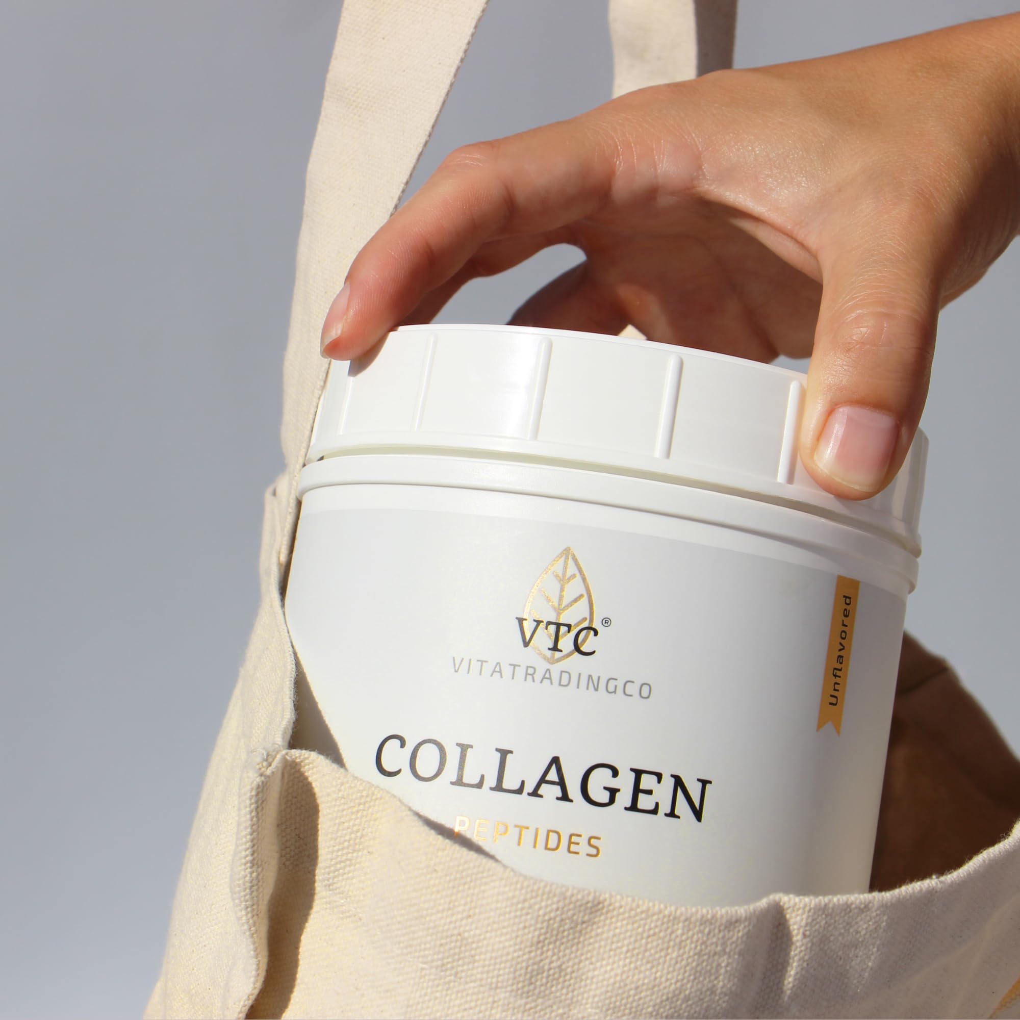 VTC Collagen Peptides Powder in a glass of water