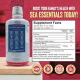 Wellgenix Sea Essentials Liquid Mineral Supplement 32 fl oz with glass of water