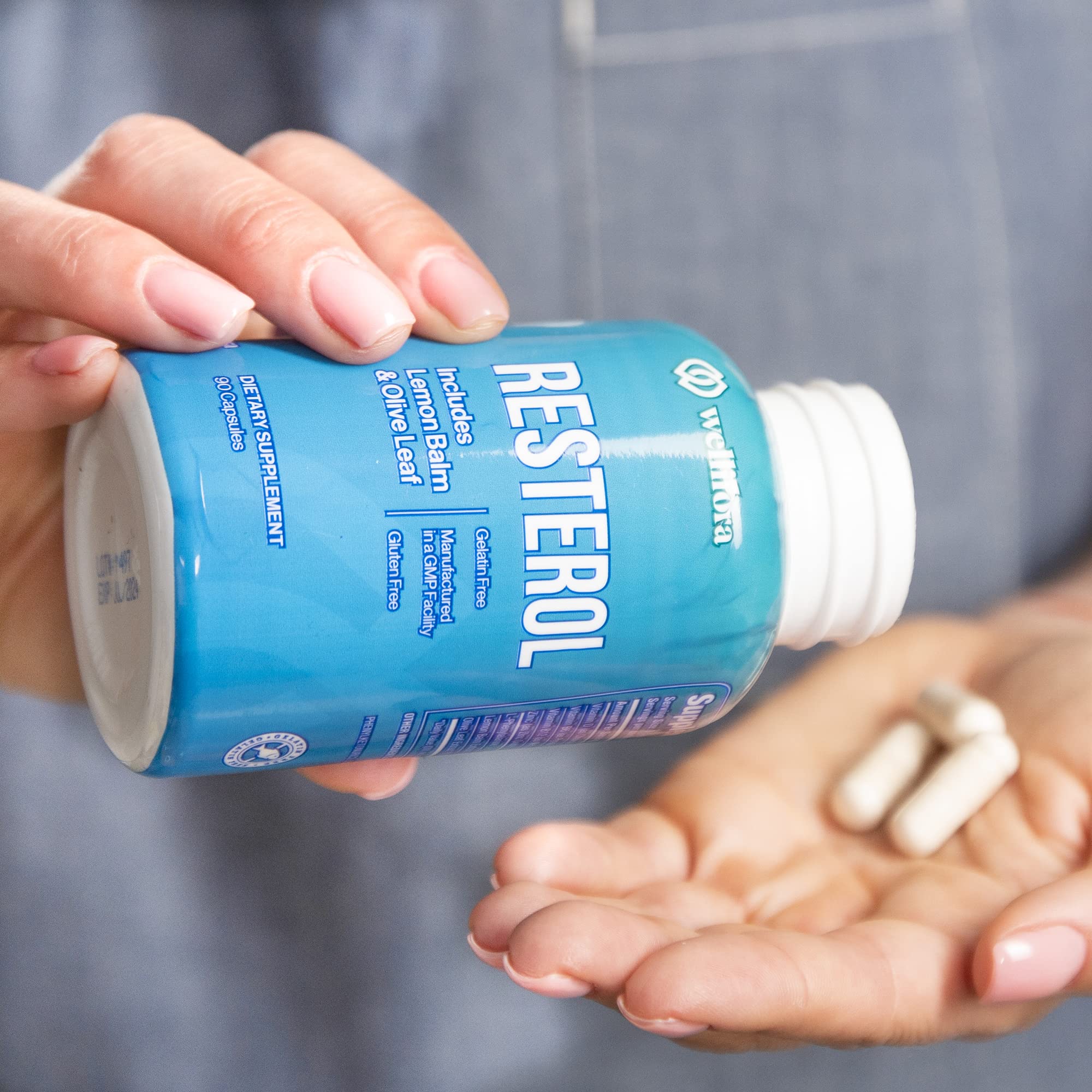 Wellifora Melanin Support Capsules displayed with a measuring spoon
