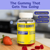 Wellio Daily Fibre Gummies on a wooden table