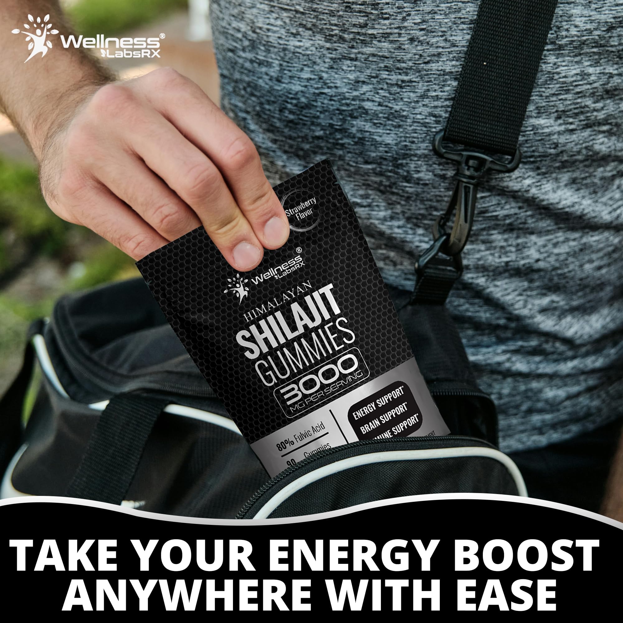 WELLNESS LABSRX Shilajit Gummies with a glass of water