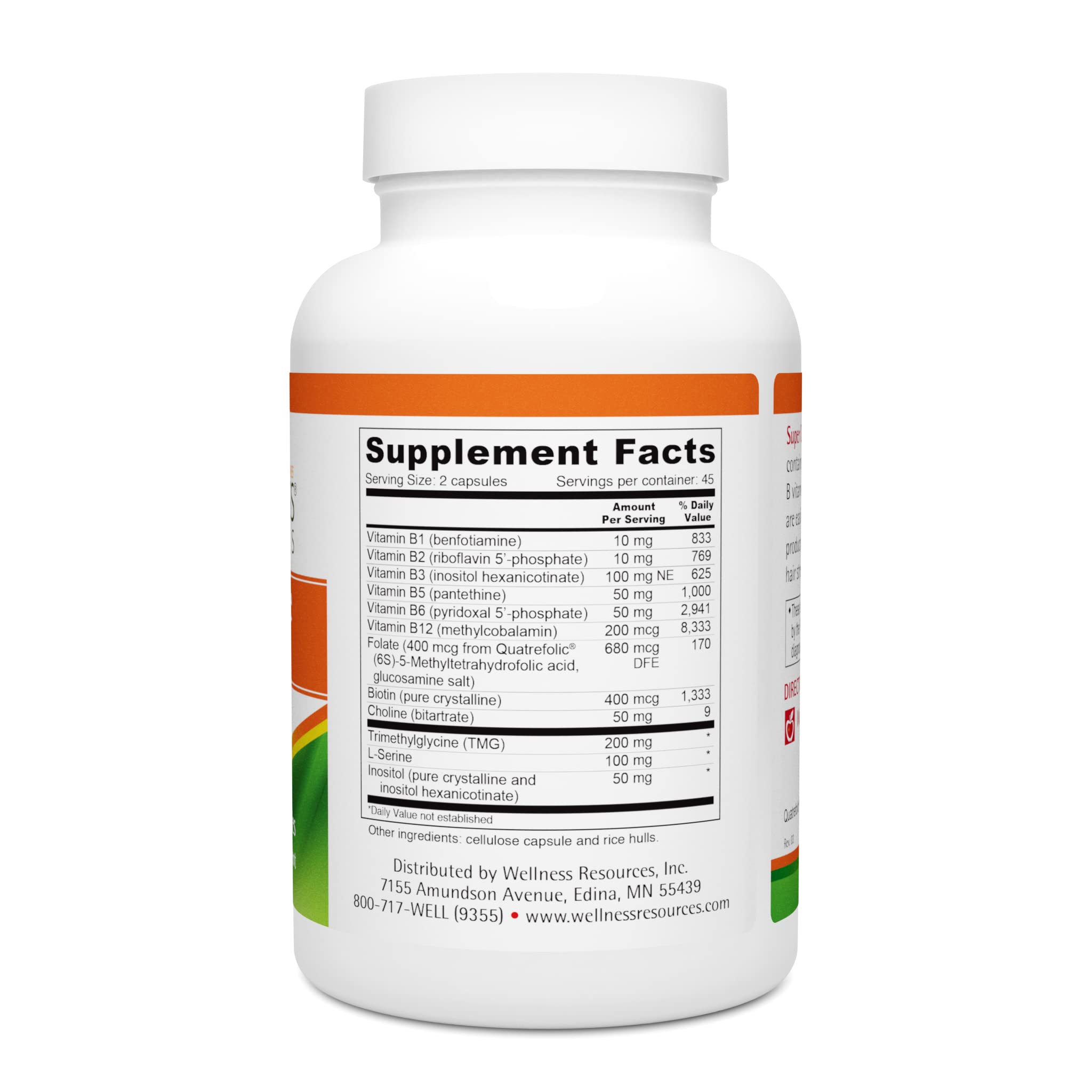 Wellness Resources B-Complex Vitamin Supplement on a wooden table