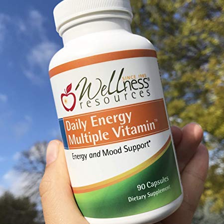 Wellness Resources Daily Energy Multiple Vitamin on a wooden table