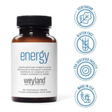 Weyland Energy B-Complex on a wooden table with natural lighting