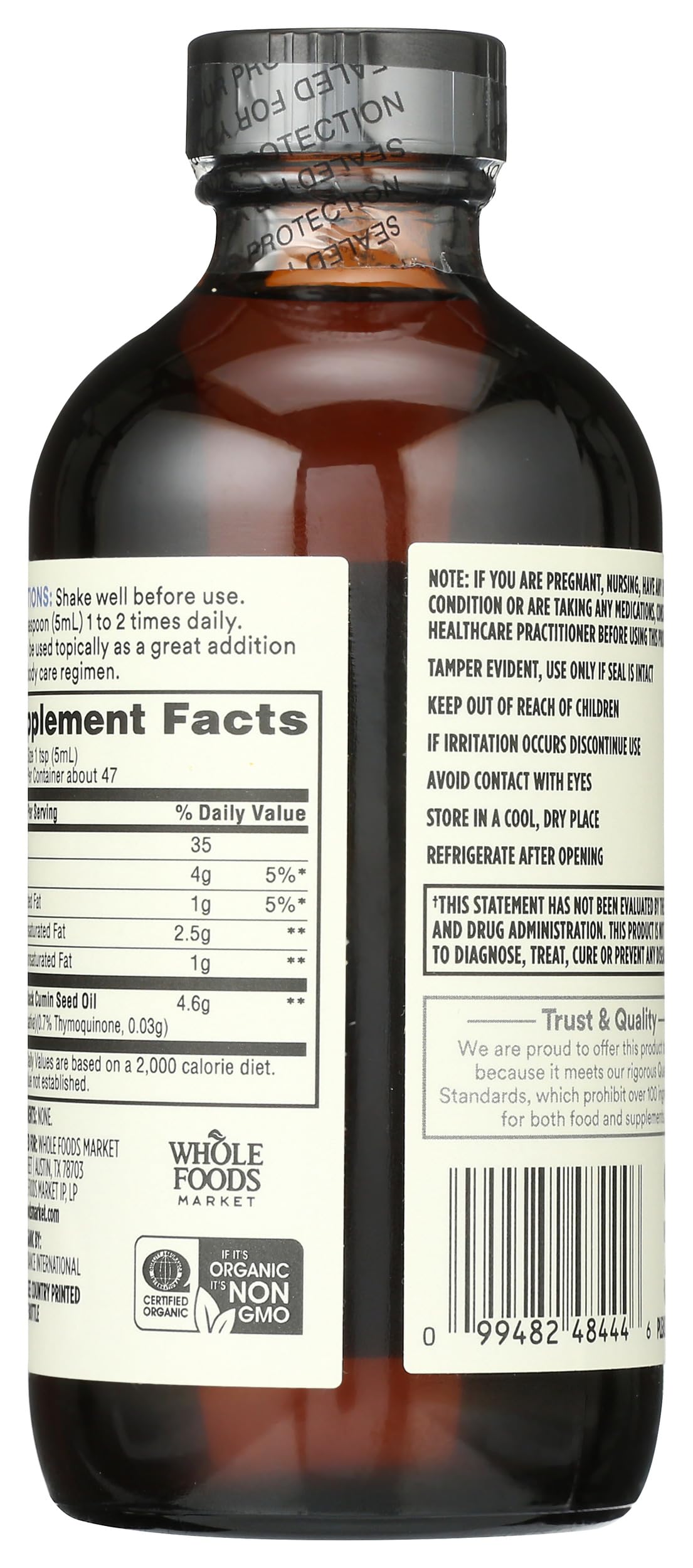 Whole Foods Market Black Seed Oil bottle with label