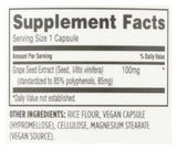 Whole Foods Market Grape Seed Extract capsules on a wooden surface