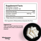 Wholesome Story N-Acetyl-L-Carnitine capsules in a hand