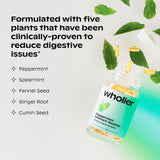 wholier Peppermint Stomach Soother capsules on a wooden table