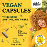 Wild & Organic Astragalus Capsules on a wooden table