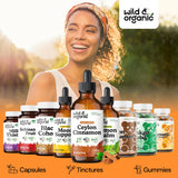 Wild & Organic Ceylon Cinnamon Drops 500mg bottle on a wooden table