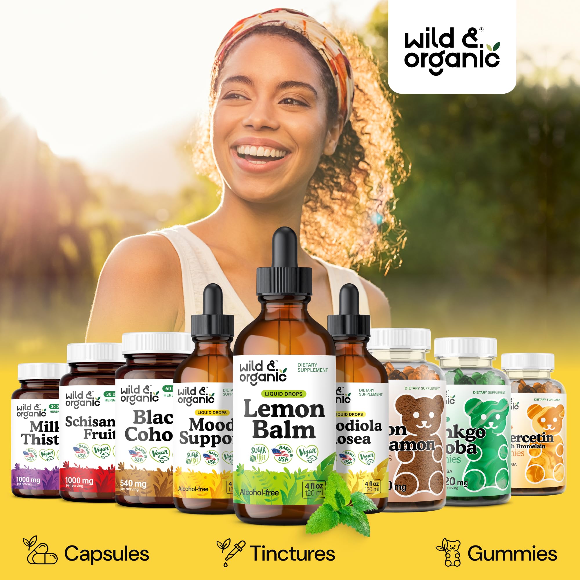 Wild & Organic Lemon Balm Tincture with fresh lemon balm leaves
