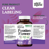 Wild & Organic Passion Flower Capsules on a wooden table
