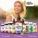 Wild & Organic Passion Flower Tincture on a wooden table