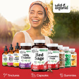 Wild & Organic Red Sage Root Capsules with a measuring spoon