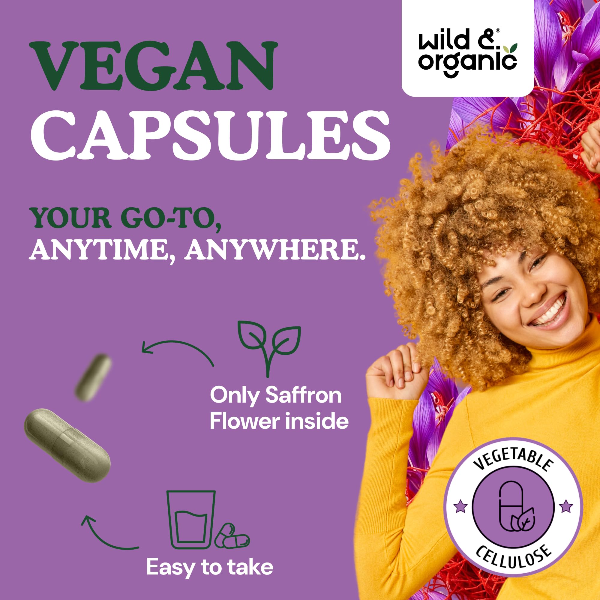 Wild & Organic Saffron Capsules bottle with capsules on a wooden surface