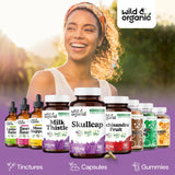 Wild & Organic Skullcap Capsules 1200mg on a wooden table
