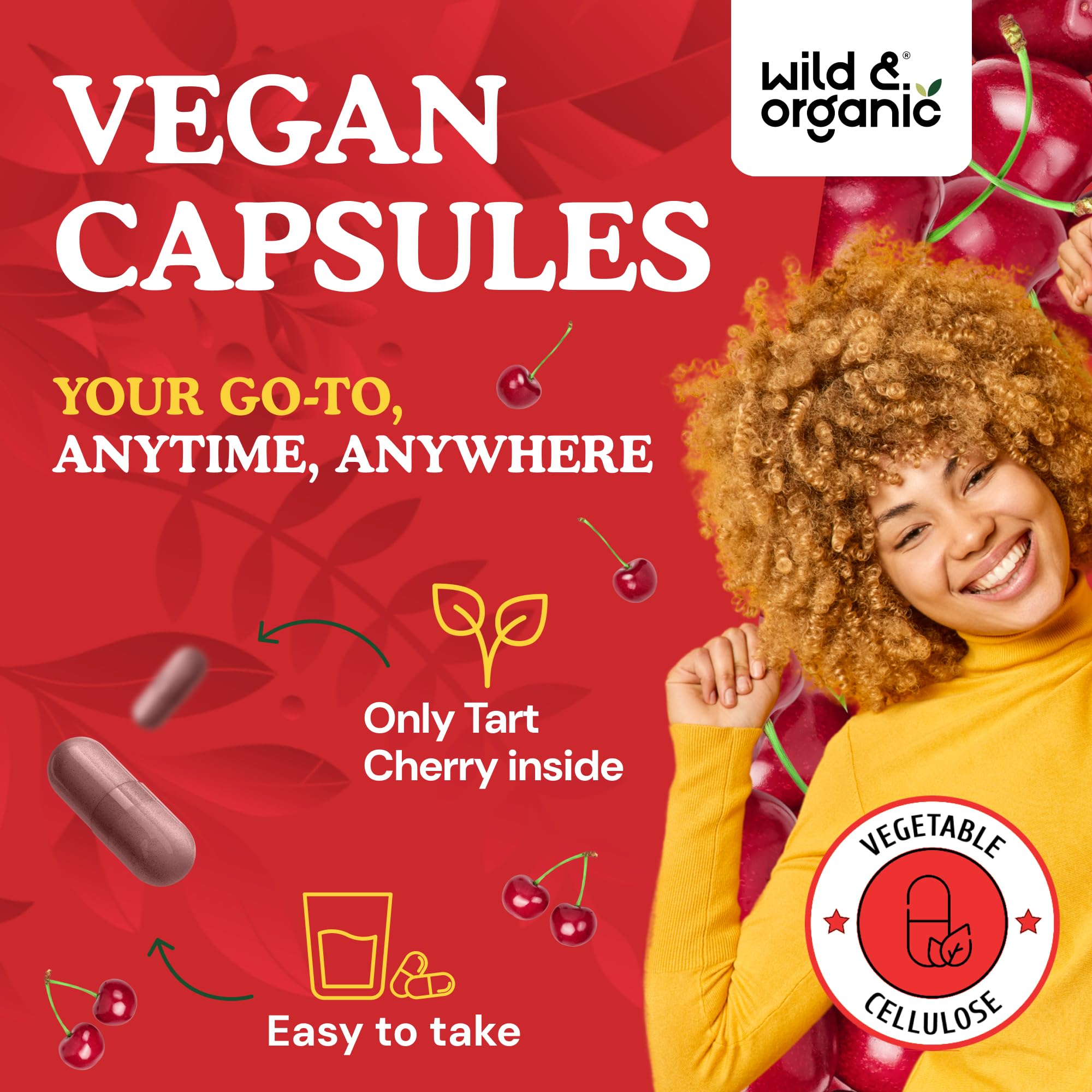 Wild & Organic Tart Cherry Capsules on a wooden table
