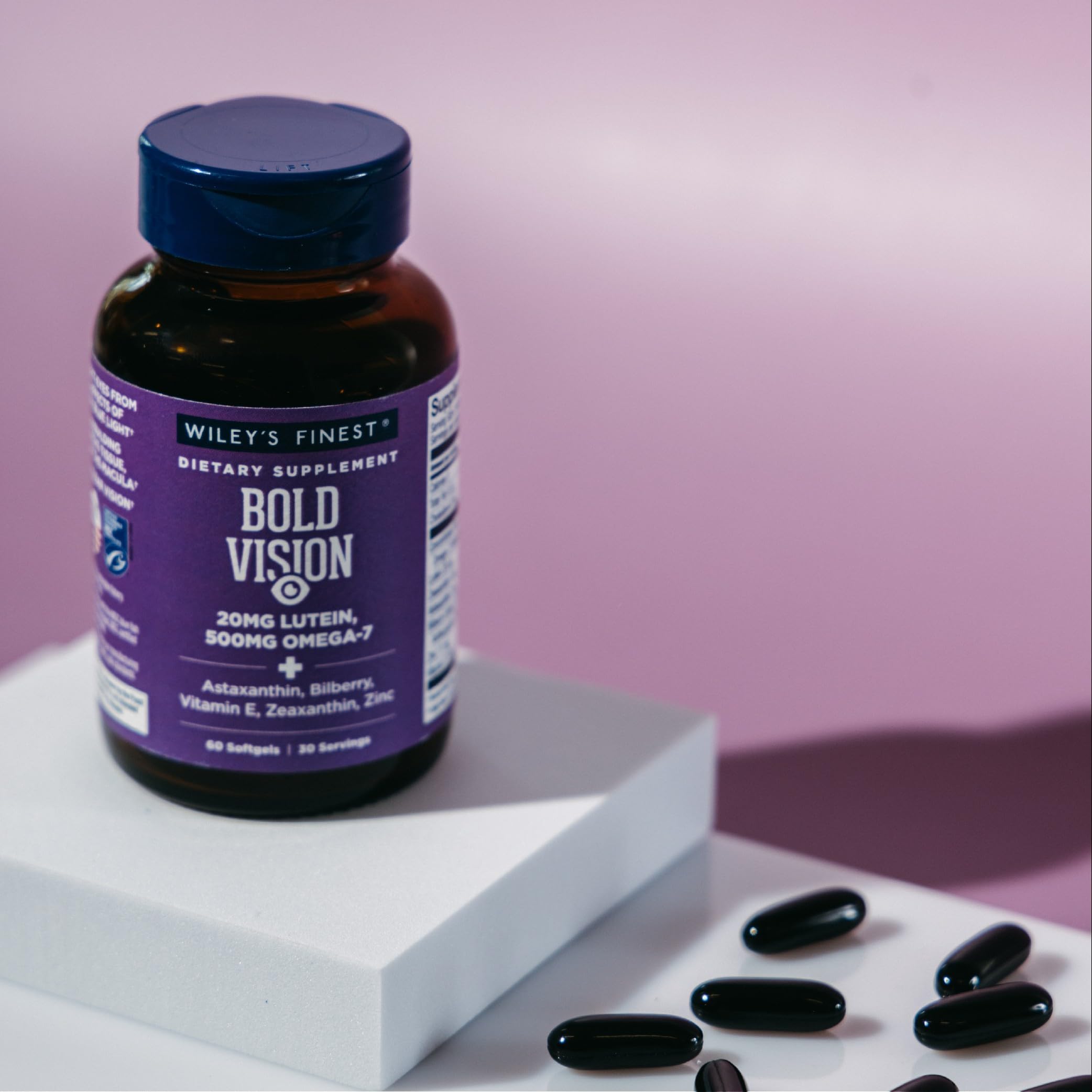 Wiley's Finest Bold Vision Omega-7 Fish Oil Supplement with a measuring spoon