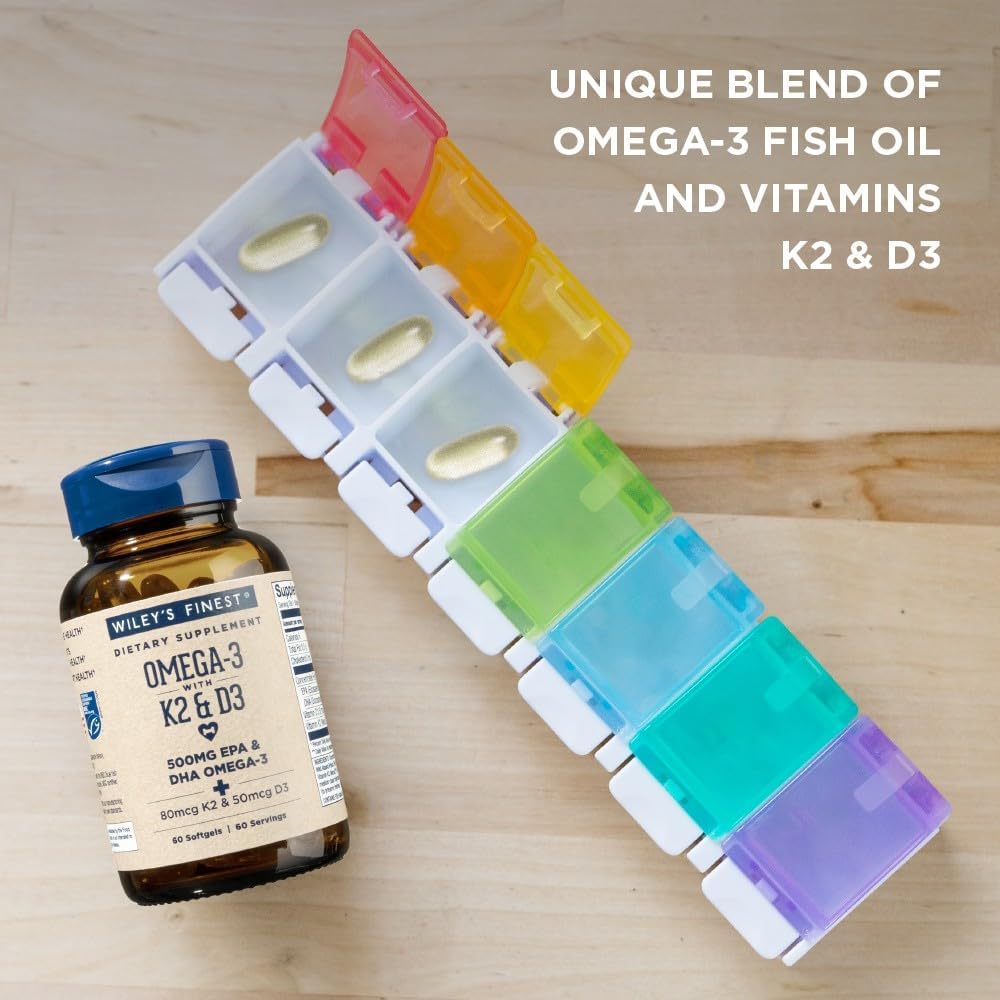Wiley's Finest Omega-3 Fish Oil bottle with capsules on a wooden table