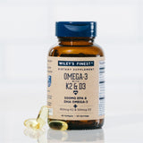 Wiley's Finest Omega-3 Fish Oil supplement with a measuring spoon