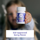 Wink Naturals Kids Melatonin Sleep Melts in a child's hand