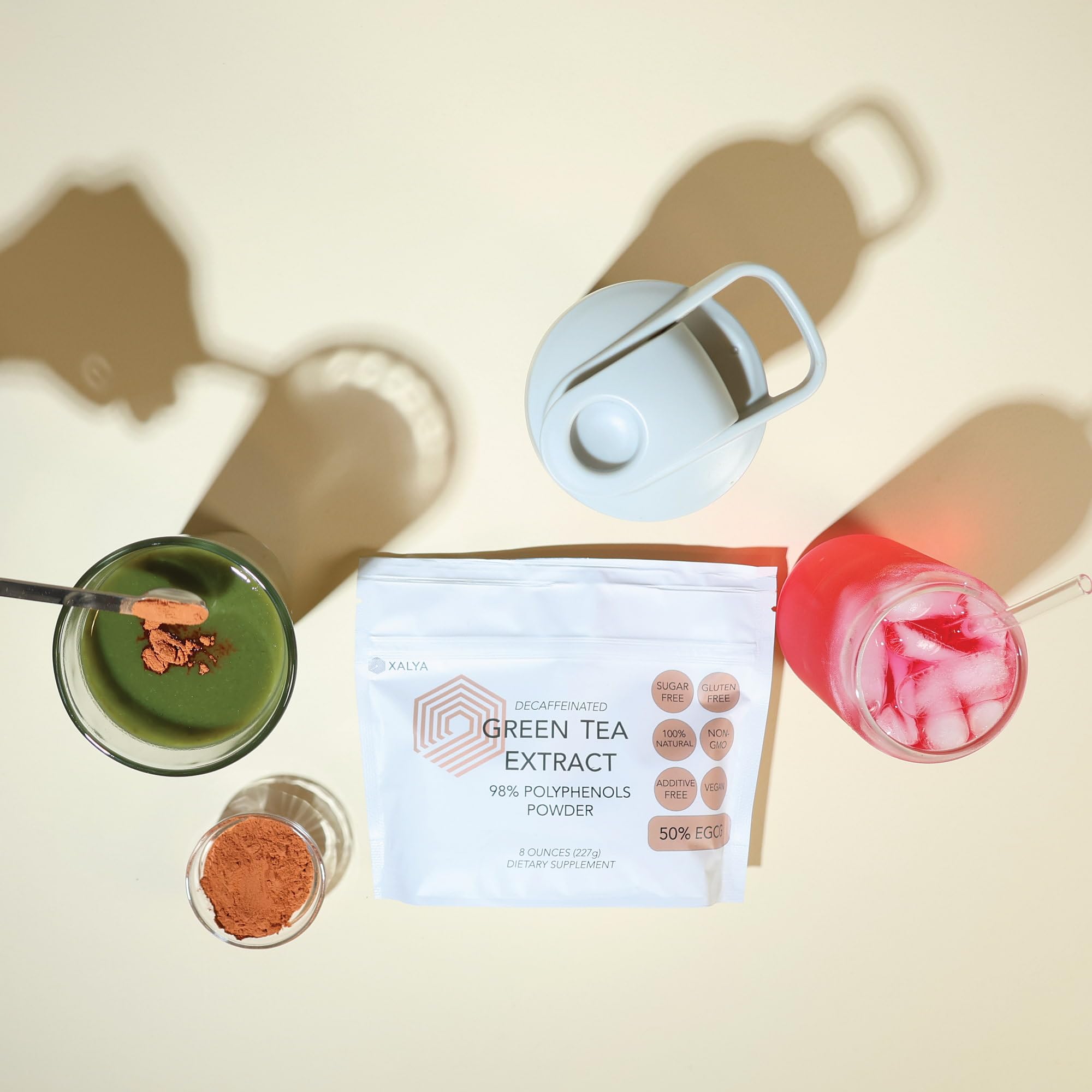 Xalya Green Tea Extract Powder in a coffee cup