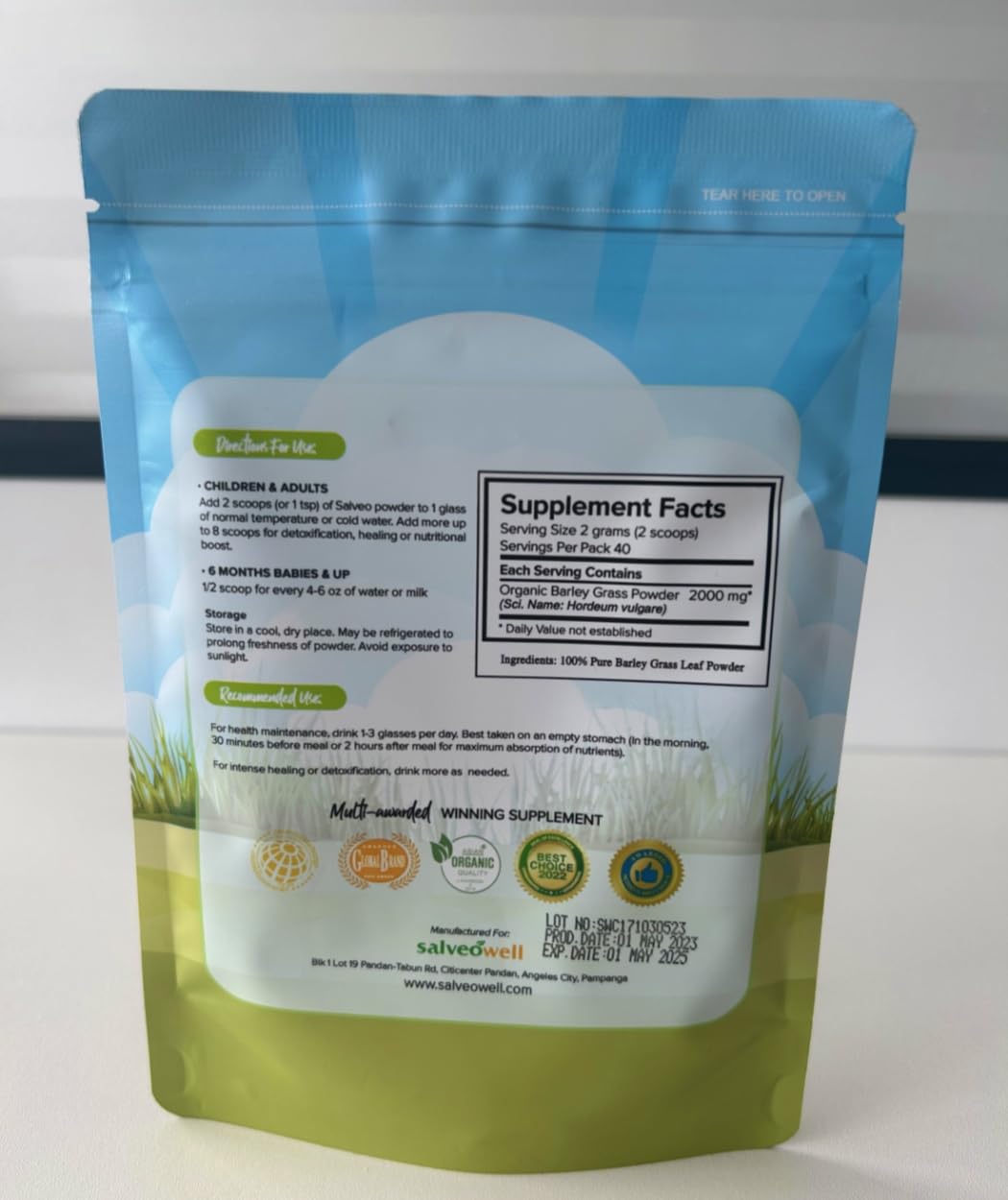 XLXZHYF Salveo Barley Grass Powder in a glass of water