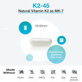 XYMOGEN K2-45 Vitamin K supplement on a wooden table