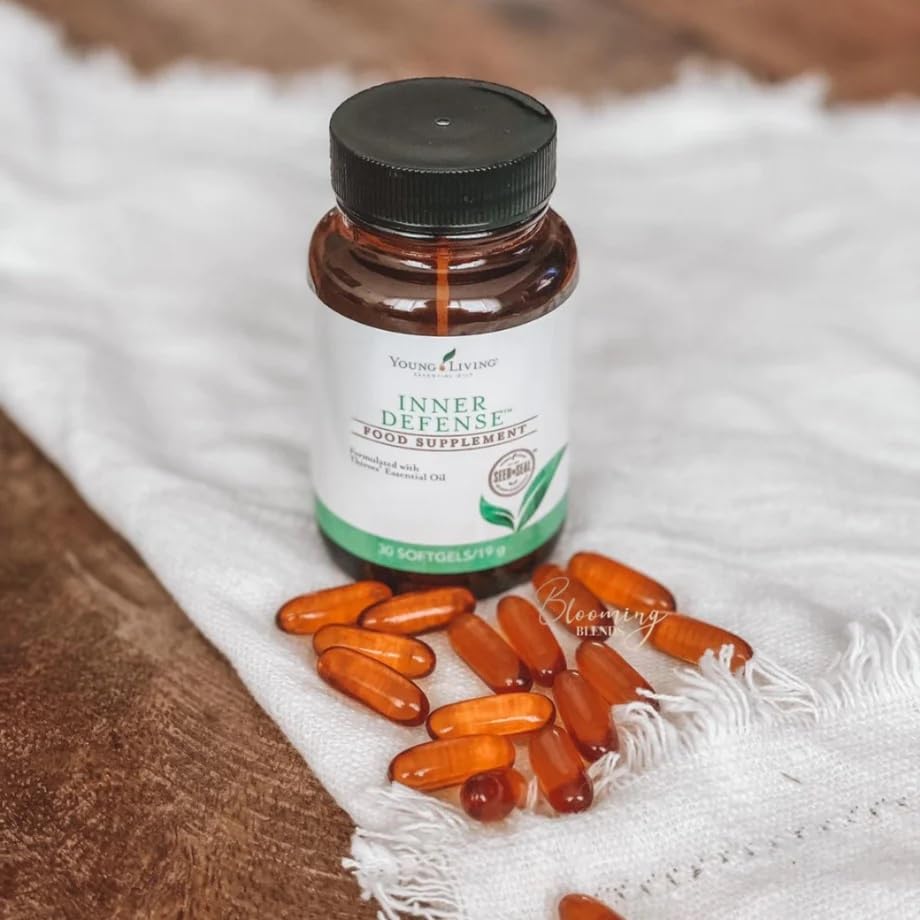 Young Living Inner Defense Oregano Softgels displayed with herbal supplements