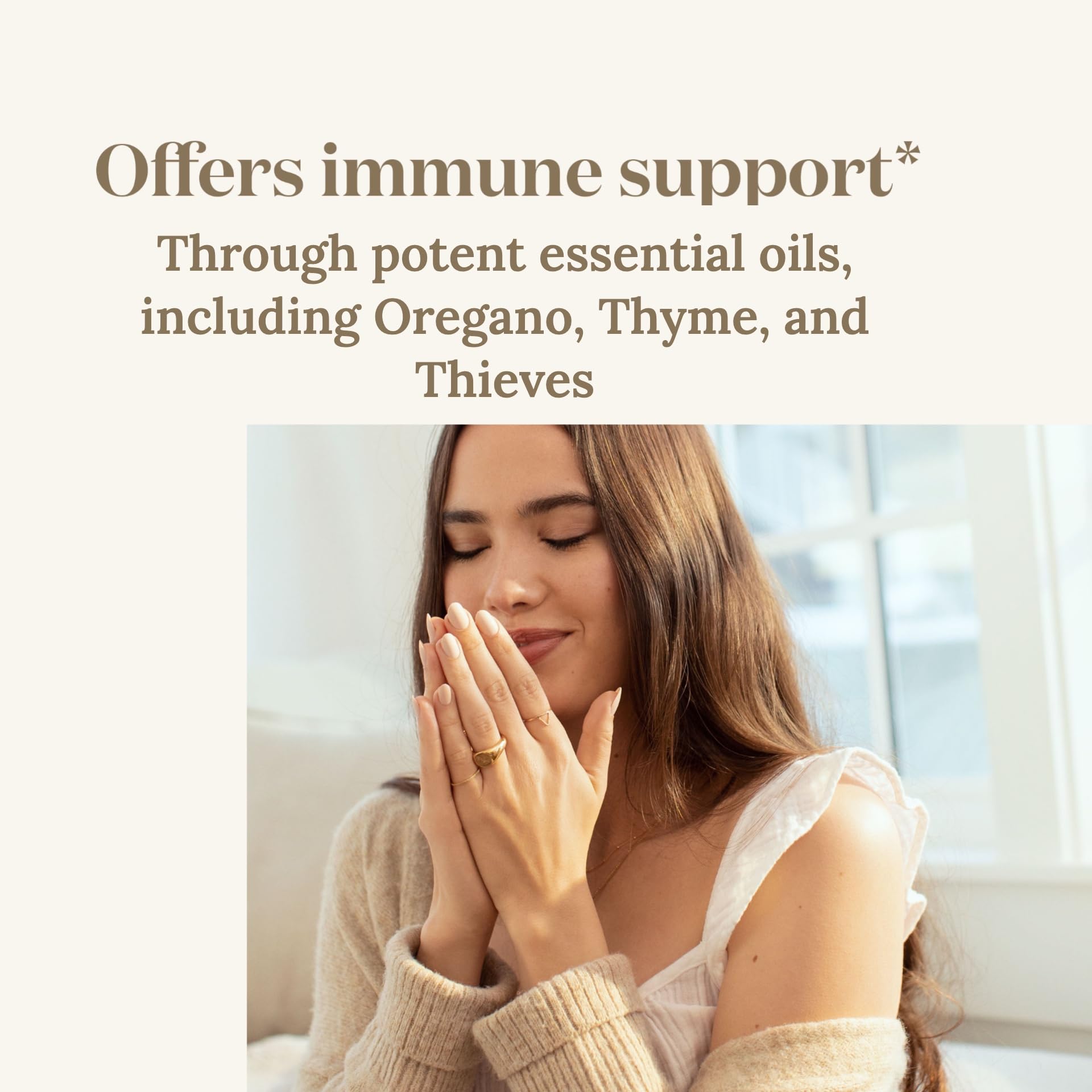Young Living Inner Defense Oregano Softgels packaging on a wooden table