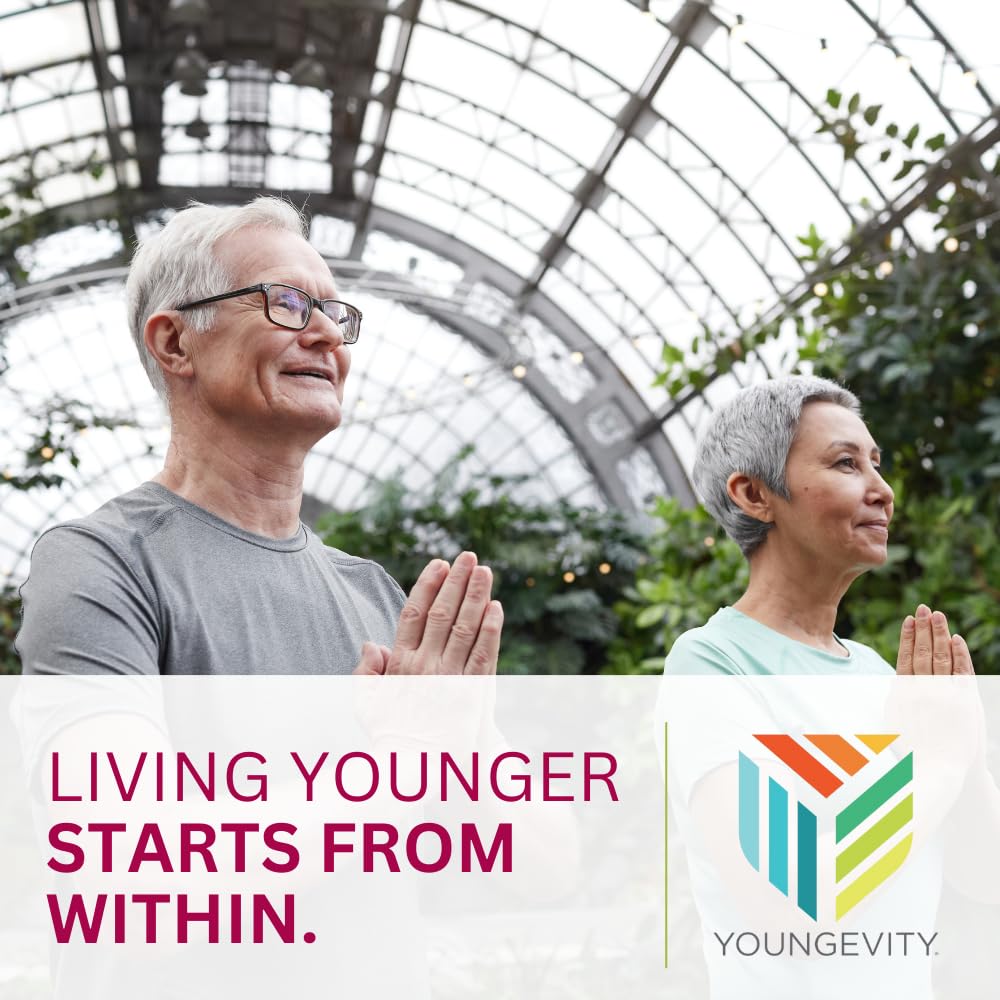 Youngevity All-In-One Supplement with a glass of water
