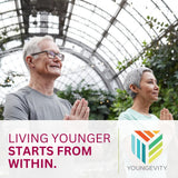 Youngevity All-In-One Supplement with a glass of water