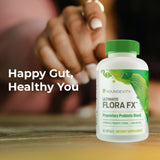 Youngevity Flora FX Probiotic Prebiotic Supplement with a glass of water