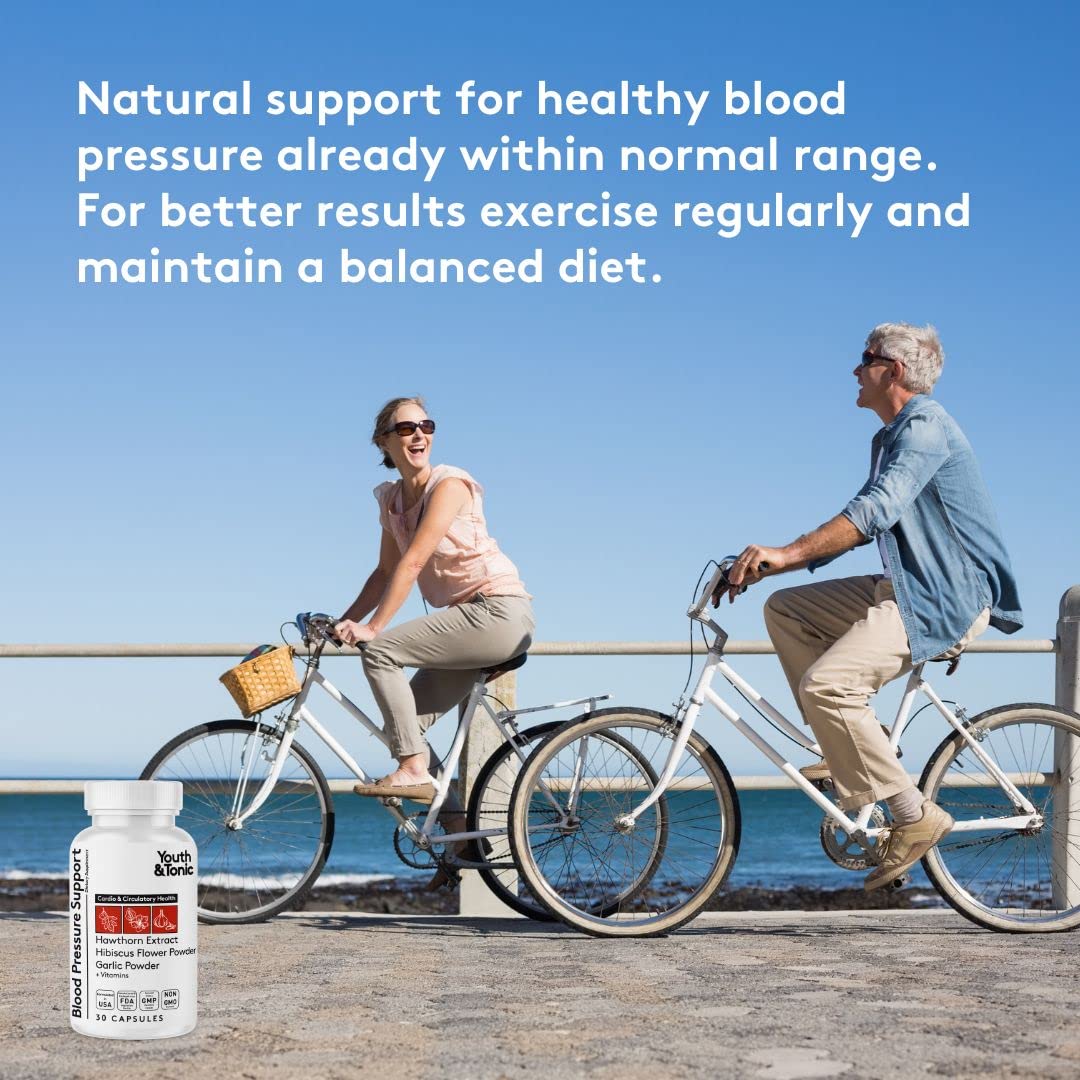 Youth & Tonic Hawthorn Supplement capsules on a wooden surface