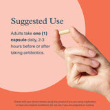 Youtheory 2X Action Probiotic displayed with a glass of water