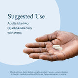 Youtheory Ashwagandha supplement with a measuring spoon
