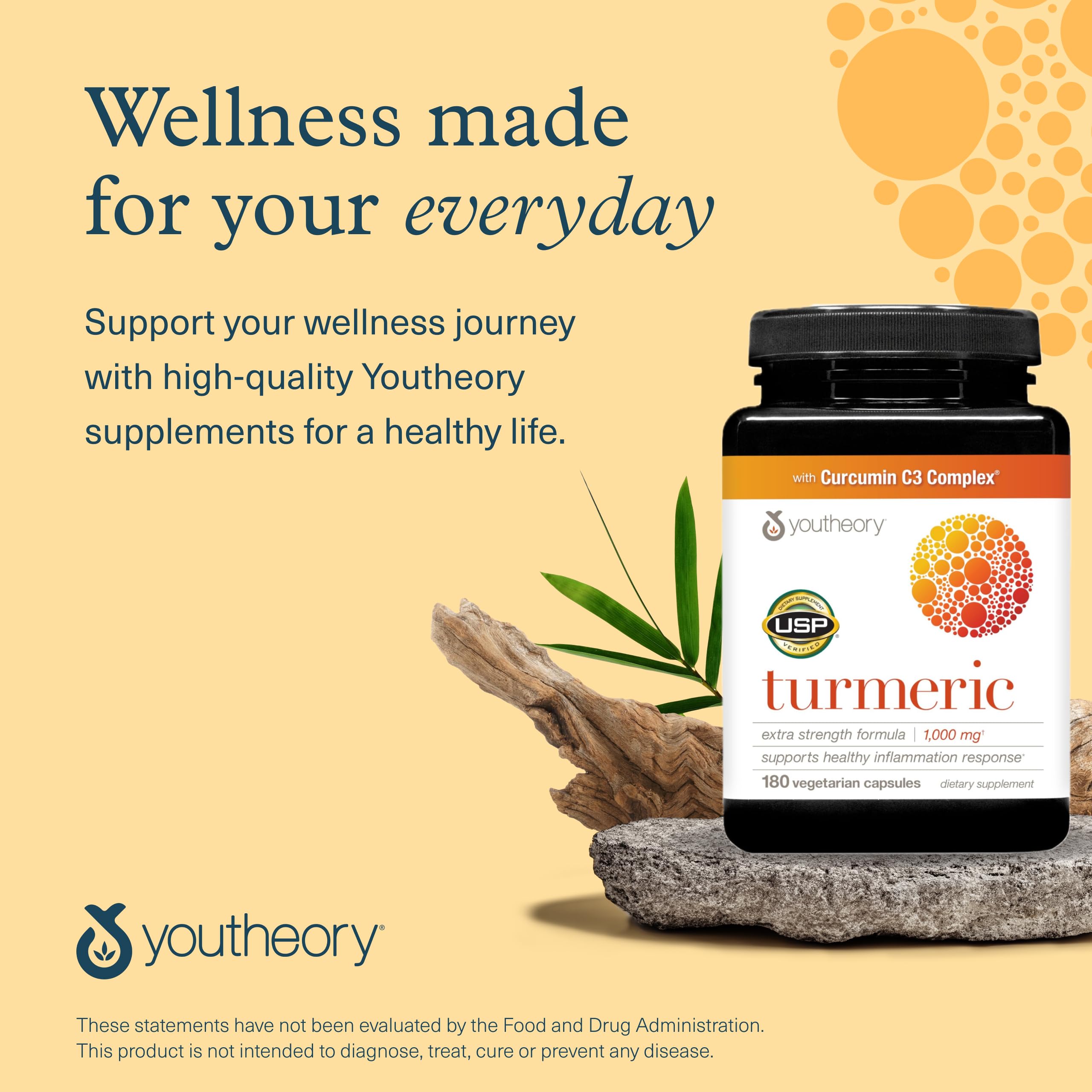 Youtheory Extra Strength Turmeric Capsules in a hand